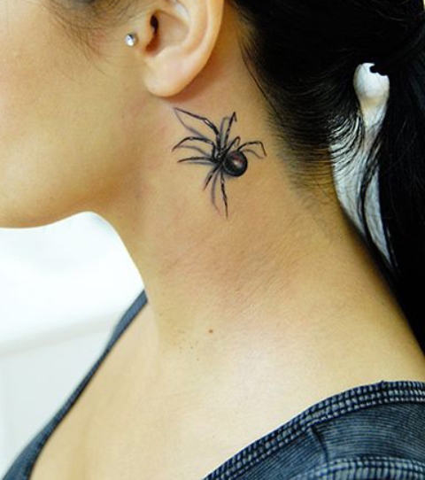 Perfect spider tattoo on the neck