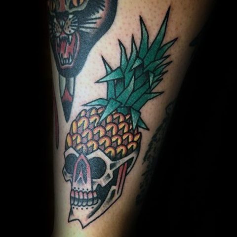Pineapple with a skull tattoo design