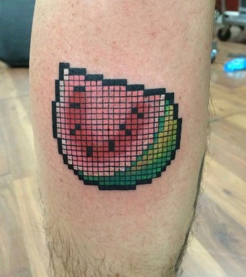 Pixel watermelon tattoo on the leg