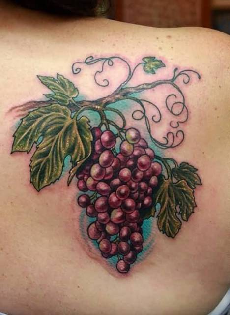 Purple grape tattoo on the back