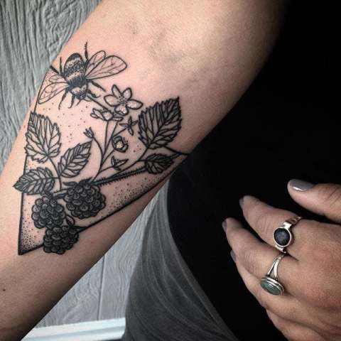 Raspberry and bee tattoo