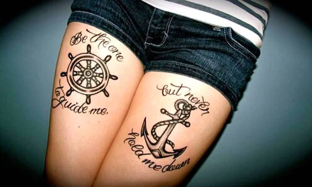 Tattoo with a quote on the legs