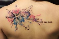 Tattoo with colored splashes on the back