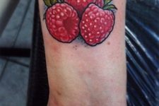 Three berries tattoo on the wrist
