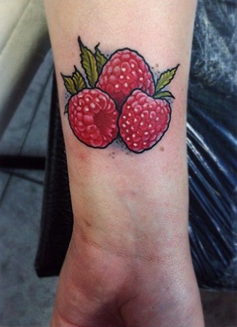 Three berries tattoo on the wrist