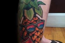 Tropical styled tattoo on the leg
