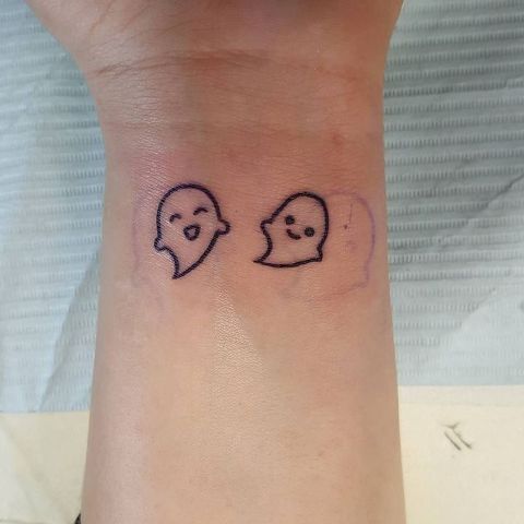 Two tiny tattoo ideas on the wrist