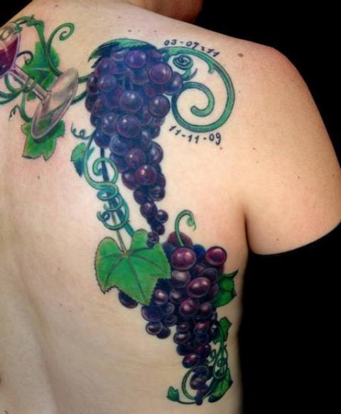 Wine glass and grape tattoo on the back and side