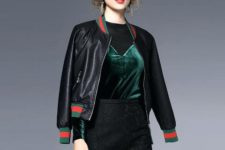 With black shirt, emerald velvet top and high-waisted skirt