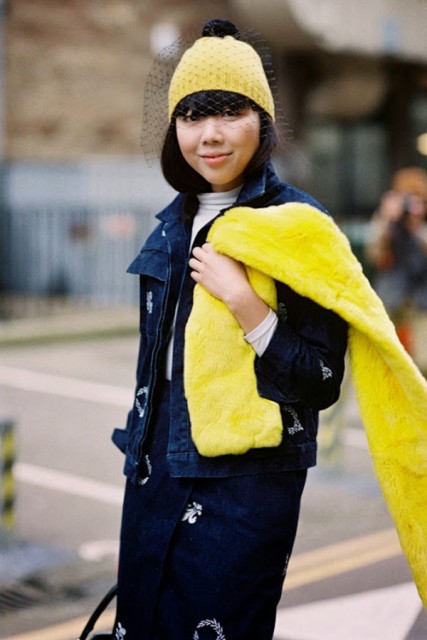 With jacket, yellow scarf, white shirt and skirt