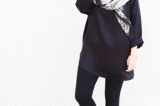 With navy blue dress, printed scarf and black tights