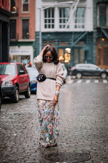 With oversized sweater and floral maxi skirt