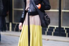 With pleated maxi dress, high heels and black bag