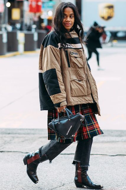 With two colored oversized jacket, plaid dress, jeans and black leather bag