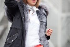 With white shirt, leather pants and fur parka coat