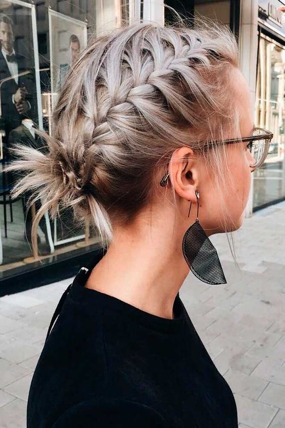a lovely braided updo with some twists left at the ends is a cool idea if you love brads but have short hair