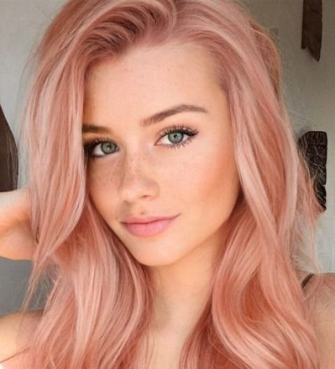 medium-length strawberry blonde layered hair with volume is a very cute and lovely idea