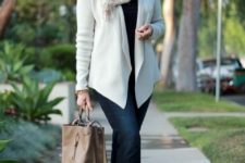 navy jeans, a black tee, leopard print booties, a brown bag and a creamy cardigan plus a scarf