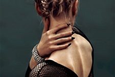 short blonde hair fully braided and secured on the top is a very cool and eye-catchy idea to try