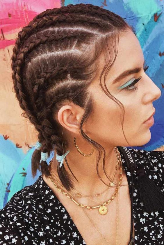 short hair styled with multiple braids and waves down is a cool idea to rock for an edgy and a bit boho look