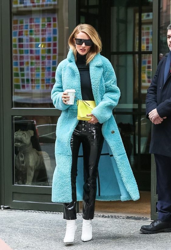 a long colorful faux fur coat is a great idea, add trendy white boots, too
