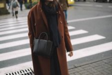 10 a total black look with a scarf, rock boots, a bag and a chocolate brown coat