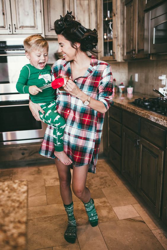 a plaid oversized shirt worn as a dress and printed green socks for a fun and simple Christmas look