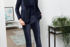 14 a navy velvet pantsuit with a matching turtleneck and printed shoes for a retro-inspired work look