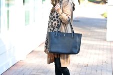 With beige cardigan, black pants, brown boots, tote and leopard scarf