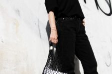 With black shirt, crop pants and black flat shoes
