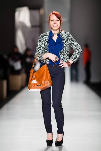 With blue ruffled blouse, skinny pants, printed blazer and high heels