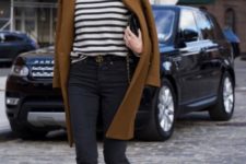 With brown coat, crop jeans, clutch and black ankle boots