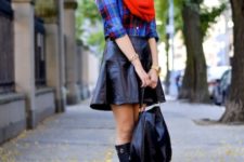 With checked shirt, red scarf, leather skirt and high boots