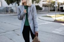 With emerald blouse, long blazer, crop pants and white shoes