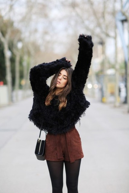 With faux fur loose sweater and black bag