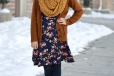 With floral dress, black tights, brown cardigan and lace up boots