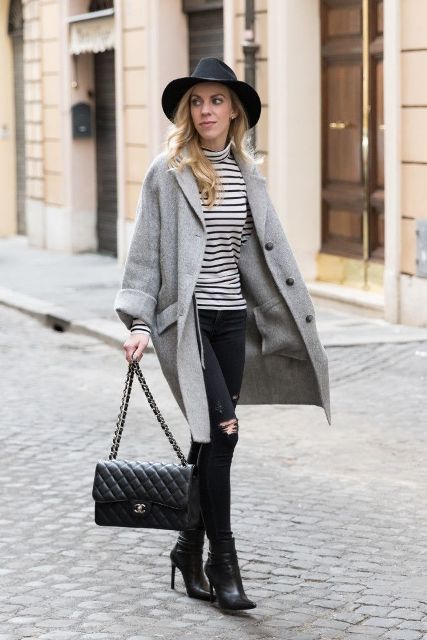 With gray coat, wide brim hat, black bag and high heeled boots