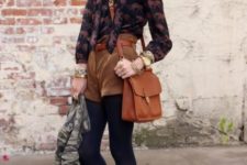 With printed shirt, crossbody bag, brown belt, black tights, lace up boots and sunglasses