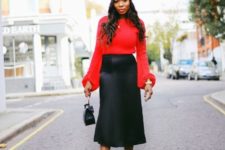 With red blouse, midi skirt, black small bag and black suede boots
