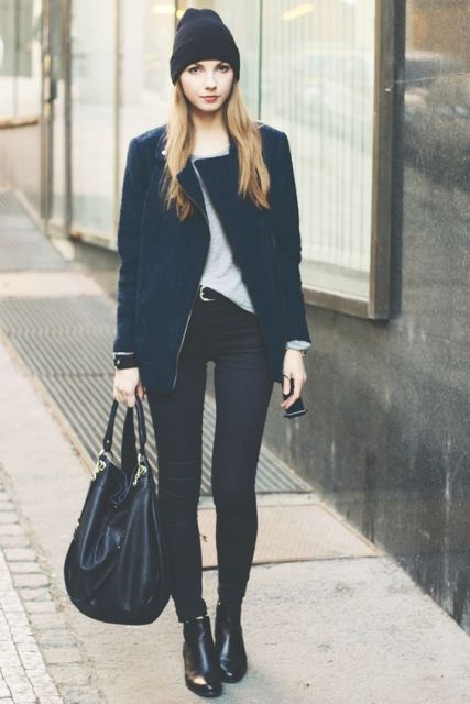 With t-shirt, navy blue jacket, hat, skinny pants and flat boots