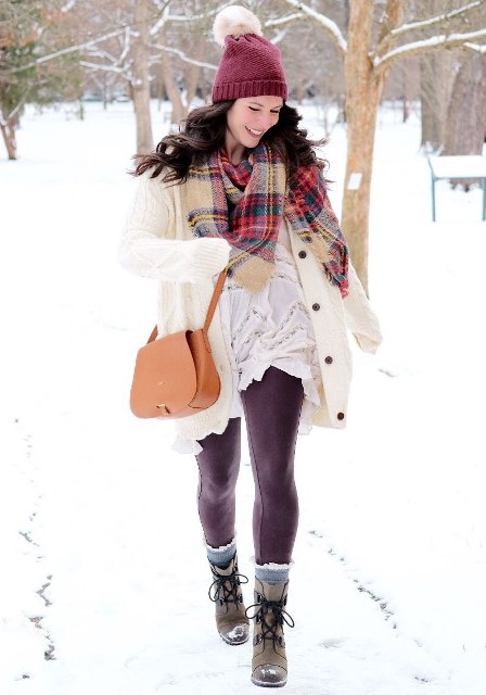 With white dress, purple tights, white cardigan, brown bag, plaid scarf and lace up boots