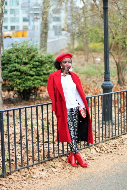 With white shirt, red coat, red leather boots and embellished trousers