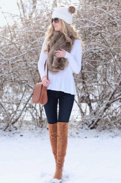 With white shirt, skinny pants, brown suede over the knee boots, fur scarf and brown bag