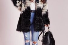 With wrapped blouse, distressed jeans, black belt, black leather bag and fringe boots