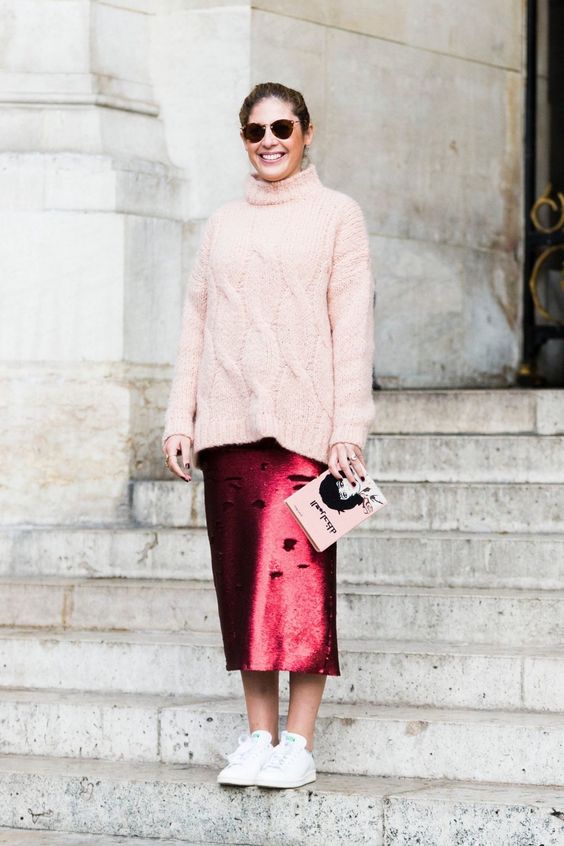 a light pink cable knit sweater, a ripped burgundy midi skirt, white sneakers for a non-typical winter look