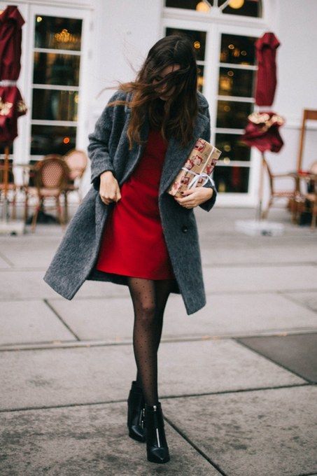 a red short dress, printed tights, black booties and a grey woolen coat for a comfy and sexy look