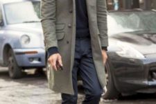 04 a black turtleneck, navy pants, rust shoes and a grey overcoat that makes this casual look a bit more formal