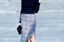 05 a black turtleneck, a silver sequin midi skit with a side slit, black spiked heels and a black clutch