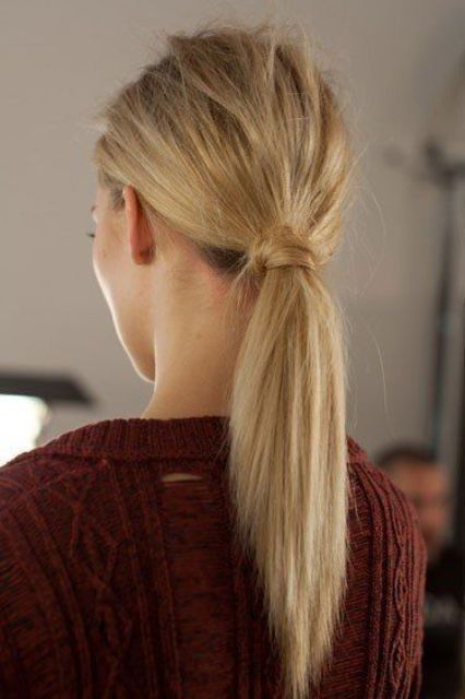 a low ponytail with straightened hair and a messy bump is a chic and modern option