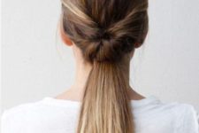10 a double twist low ponytail is a more fresh and modern take on a traditional hairstyle